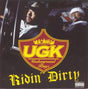 Album cover for UGK's 'Ridin' Dirty' with two individuals in a car.