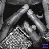 Close-up of hands holding a product with a 'Mature Content' label.