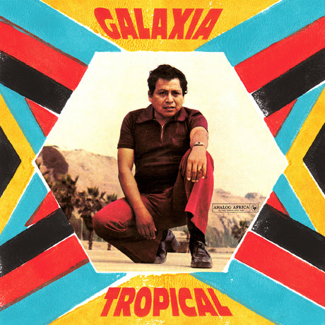 Album cover with a person in a desert setting and colorful geometric design