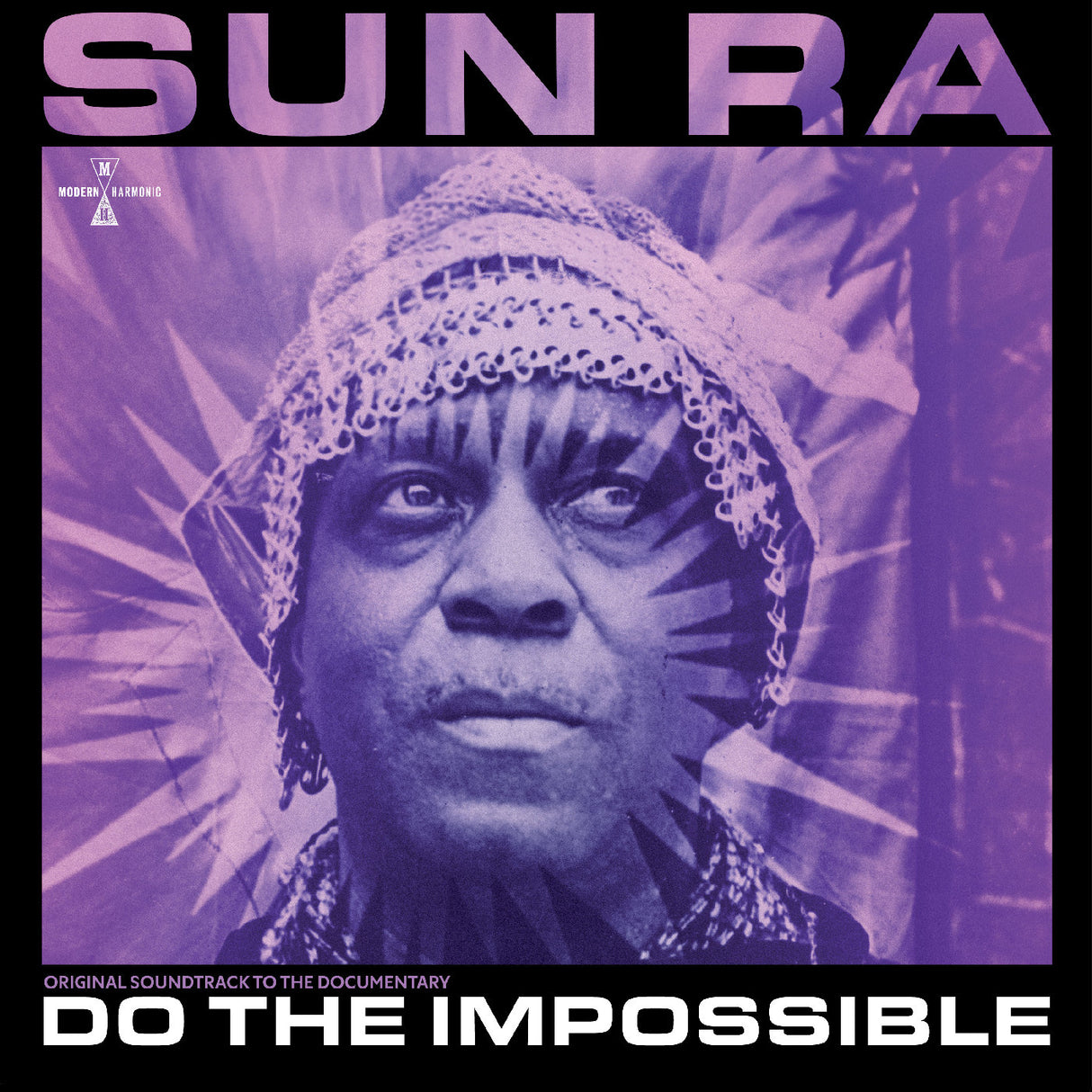 Album cover featuring a person with a headpiece and text 'Sun Ra Do The Impossible' on a purple background