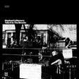 Album cover for 'Take it to The Streets' by Elephant's Memory with a black and white photo of a band on stage.