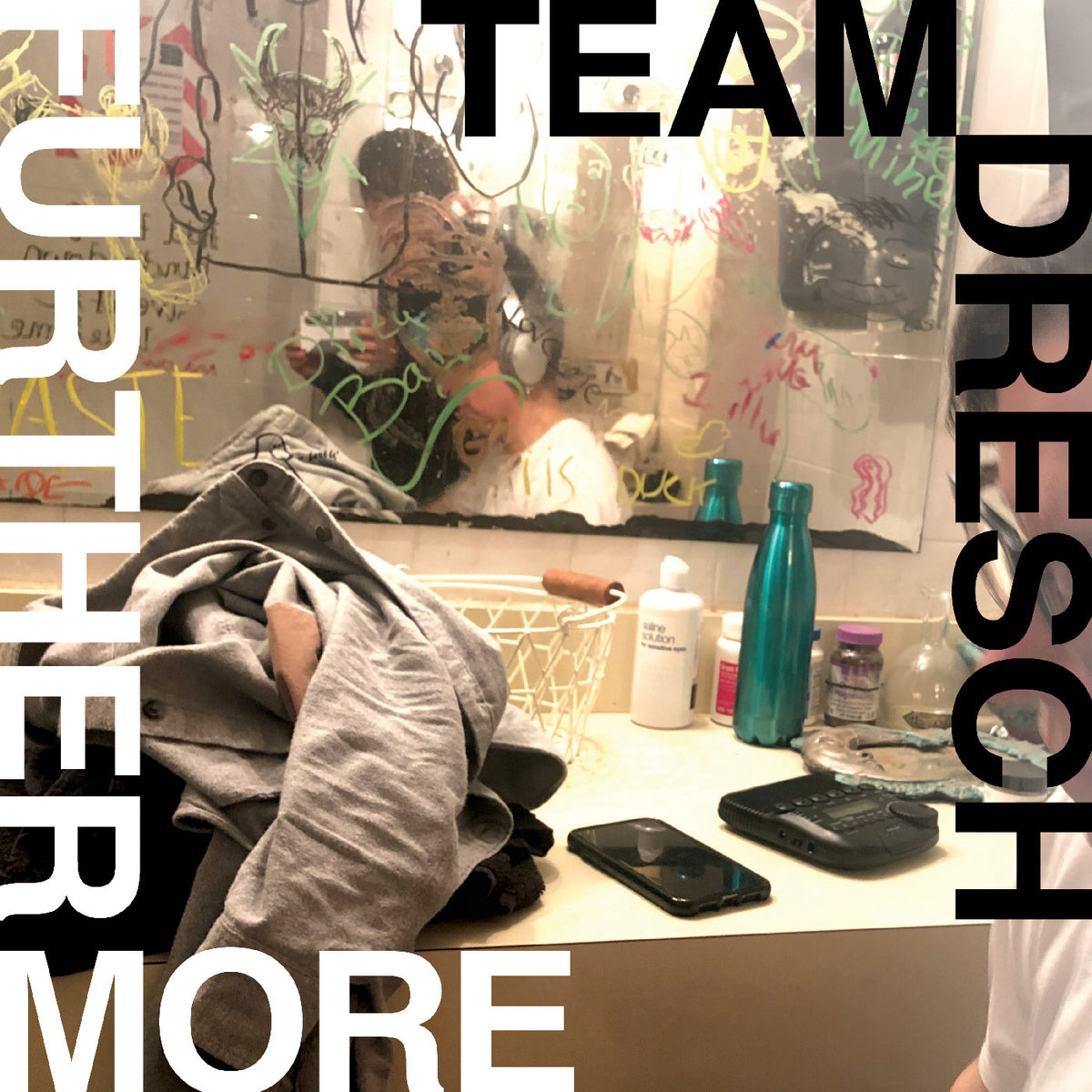 Bathroom counter with various items and text overlay