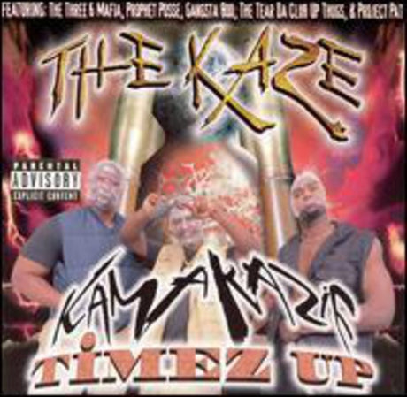 CD cover art for The Kaze - Kamakazie Timez Up featuring three men with the band name and album title written in stylized text over a fiery background.