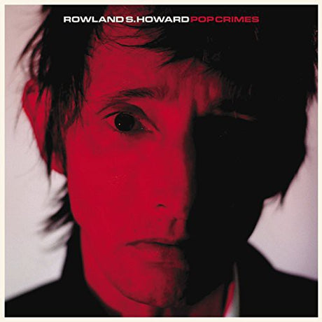 Album cover with a stylized portrait of a person with red filter, featuring the text 'Rowland S. Howard Pop Crimes'.