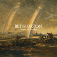 Album cover for Beth Orton's 'Comfort Of Strangers' featuring a classical landscape painting with two bright rainbows over a dark, moody sky and a small house in the foreground.