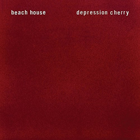 The image displays the cover of Beach House's album 'Depression Cherry'. The album cover is a plain, solid red background with the band's name 'beach house' written in a simple white font at the top and the album title 'depression cherry' in a larger white font centered at the bottom.