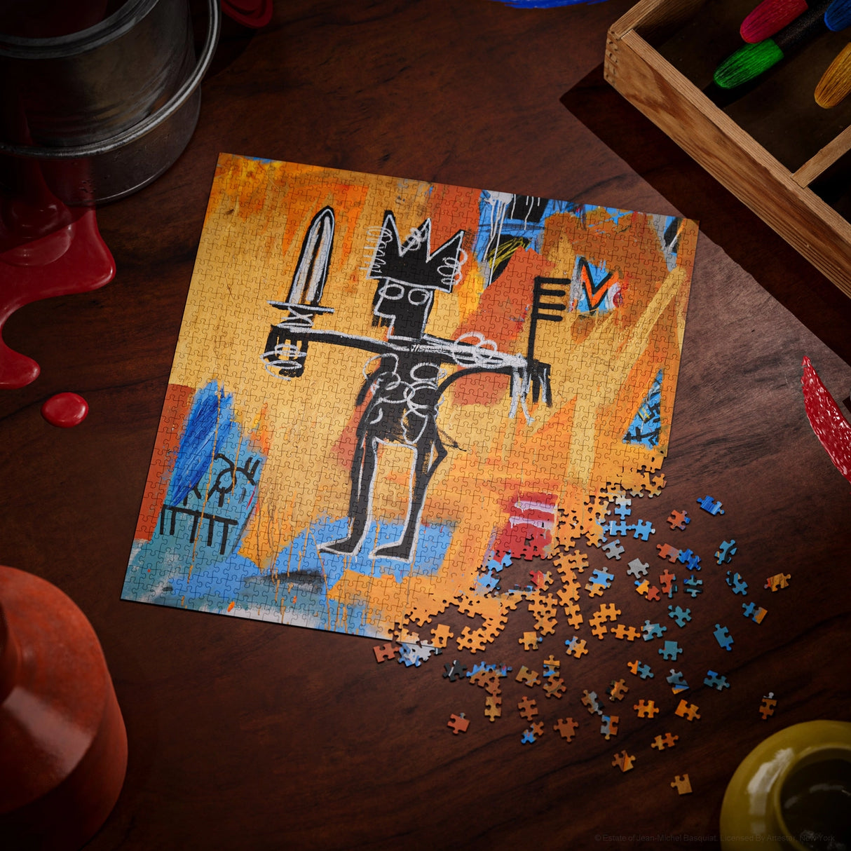 Jigsaw puzzle with a partially completed design on a wooden surface