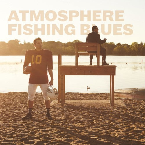 Album cover for 'Atmosphere Fishing Blues' featuring a beach scene at sunset with a football player in a dark jersey holding a helmet and a man sitting on a lifeguard stand.
