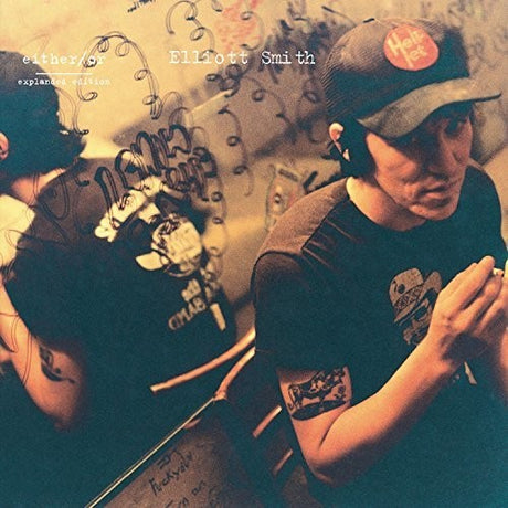 Album cover with a person wearing a cap and t-shirt, surrounded by text and graphics.