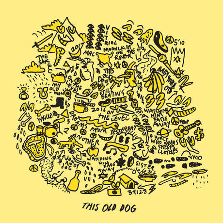 Illustrative design of a dog's head made from various symbols and text on a yellow background.