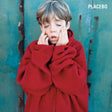 Child wrapped in a red blanket against a textured blue background with 'Placebo' text.