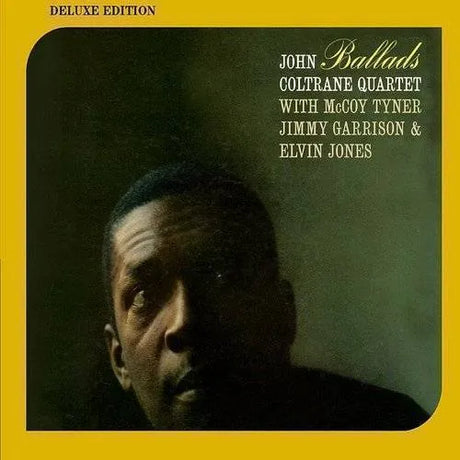 Album cover of John Coltrane Quartet's 'Ballads' with a close-up of a man's face.