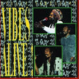 Rastafarian vinyl album cover for 'Vibes Alive!' featuring three photos of Bob Marley performing, with large yellow text and a black background patterned with small white figures.