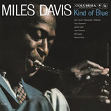 Cover of the Miles Davis album 'Kind Of Blue' featuring a black and white photo of Miles Davis with a saxophone.