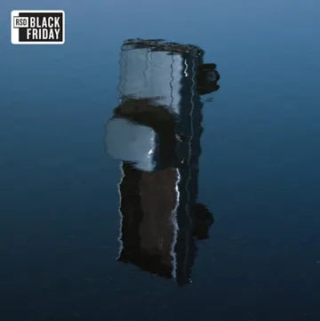 Product with a 'Black Friday' label on a reflective surface