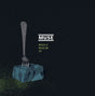 Album cover for 'Muscle Museum EP' by Muse featuring a fork on a rock against a dark background.