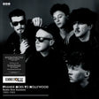 Black and white album cover of Frankie Goes to Hollywood with band members and promotional text.