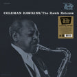 Album cover for Coleman Hawkins / The Hawk Relaxes, featuring a black-and-white portrait of the saxophonist playing, with white title text and a gold Prestige MC500 Ville label box on a dark background.