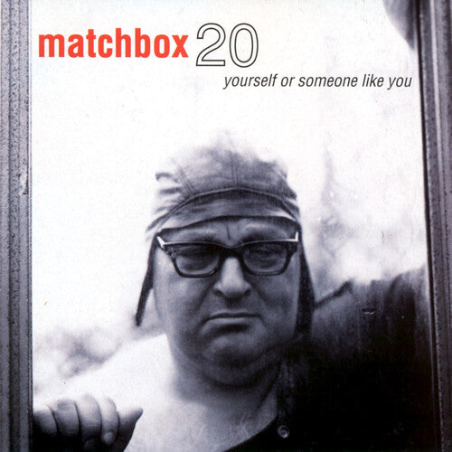 Matchbox Twenty album cover for ' Yourself or Someone Like You ' featuring a black and white photo of a man with glasses.