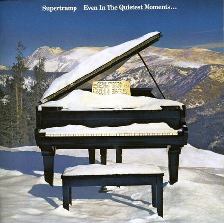 Album cover with a snowy grand piano and mountains in the background, featuring Supertramp's 'Even In The Quietest Moments'.