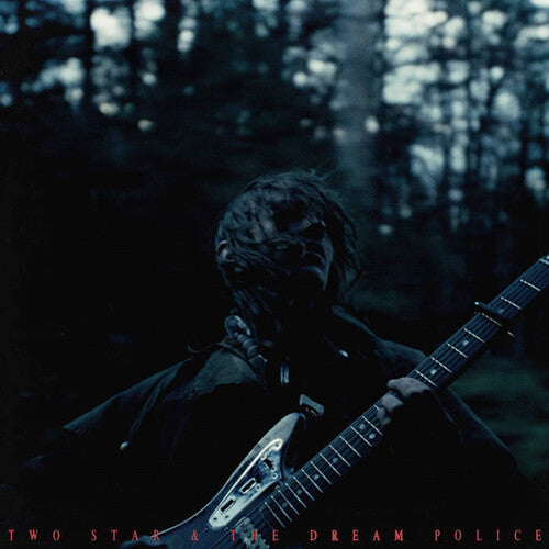 Person holding a guitar in a forest setting with 'Two Star & The Dream Police' text.