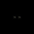 Pair of silver earrings on a black background