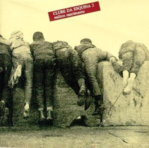 Album cover with people pushing a wall, featuring text 'Clube da Esquina 2' and 'Milton Nascimento'.