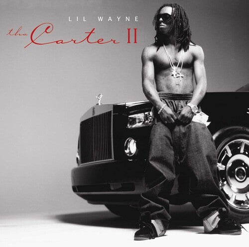Album cover featuring a person leaning against a car with 'Lil Wayne The Carter II' text.