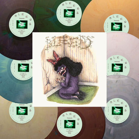 Vinyl records with a central illustration of a person with butterfly wings sitting on a bench.
