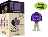 Peanuts Halloween blind box with a purple dog figure and packaging.