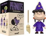 Peanuts Halloween blind box packaging with a figurine of a character in a purple outfit and wizard hat.