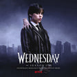 Promotional image for 'Wednesday' season 2 soundtrack with a character in a dark outfit against a foggy cemetery background.