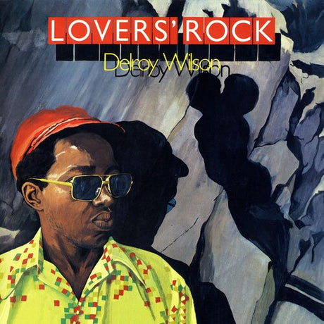 Album cover of 'Lovers' Rock' by Delroy Wilson with a person wearing sunglasses and a red cap.