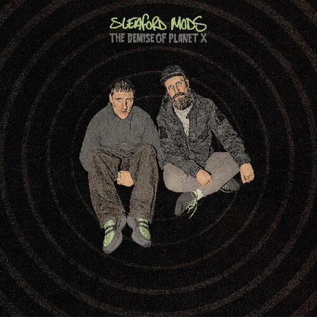 Album cover with two individuals sitting on a black spiral background, featuring the text 'Elephantsongs The Demise of Planet X'.