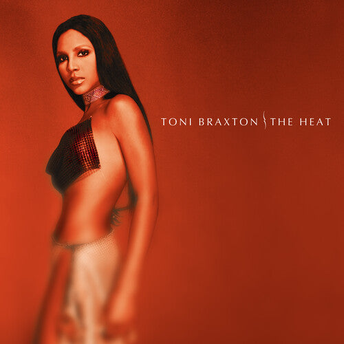 Album cover featuring a person in a strapless top with 'Toni Braxton: The Heat' text on an orange background