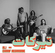 Black and white photo of a band with instruments and Arabic text at the bottom.