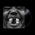 Vinyl record with a black and white image of a face on the cover