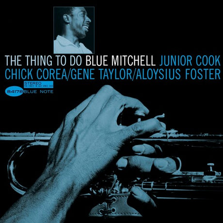 Album cover with hands playing a saxophone and text about musicians involved.