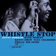Album cover for 'Whistle Stop' featuring two men with a blue band at the bottom.