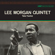 Album cover of Lee Morgan Quintet's 'Take Twelve' with a black and white photo of a man pointing.