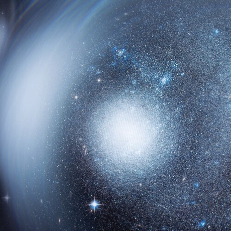 Starfield with a bright central object, likely a galaxy, in space.