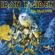 Album cover for Iron Maiden's 'Live After Death' with a skeleton holding a book in a墓地 setting.