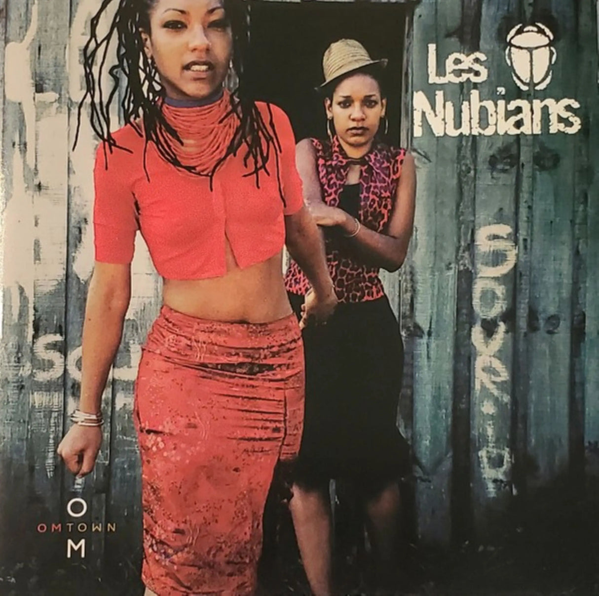 Album cover featuring two women with 'Les Nubians' branding and text.