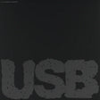 Text 'USB' in a stylized font on a black background