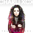 Album cover with a person with colorful hair and 'Charli XCX' branding