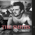 Album cover art for 'The Smiths - Best', featuring a black and white photograph of the band members, with the title in pink and white text at the bottom.