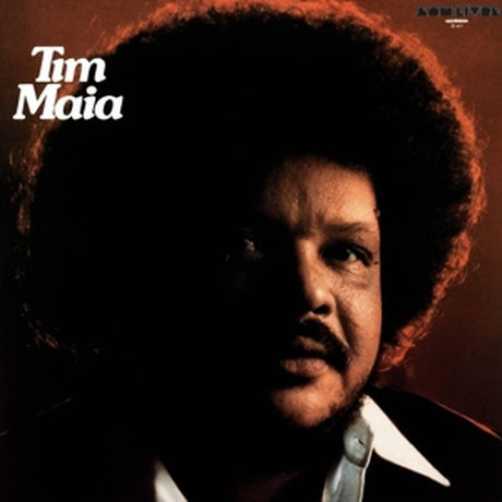 Album cover with a person's face and 'Tim Maia' text on a dark background