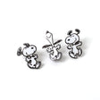 Three black and white dog-shaped earrings on a white background