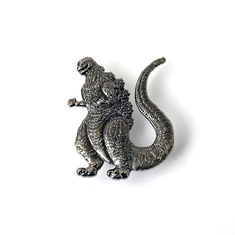 Metallic Godzilla figurine on a white background