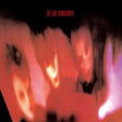 Album cover with abstract design and text 'The Cure Pornography' on a dark background